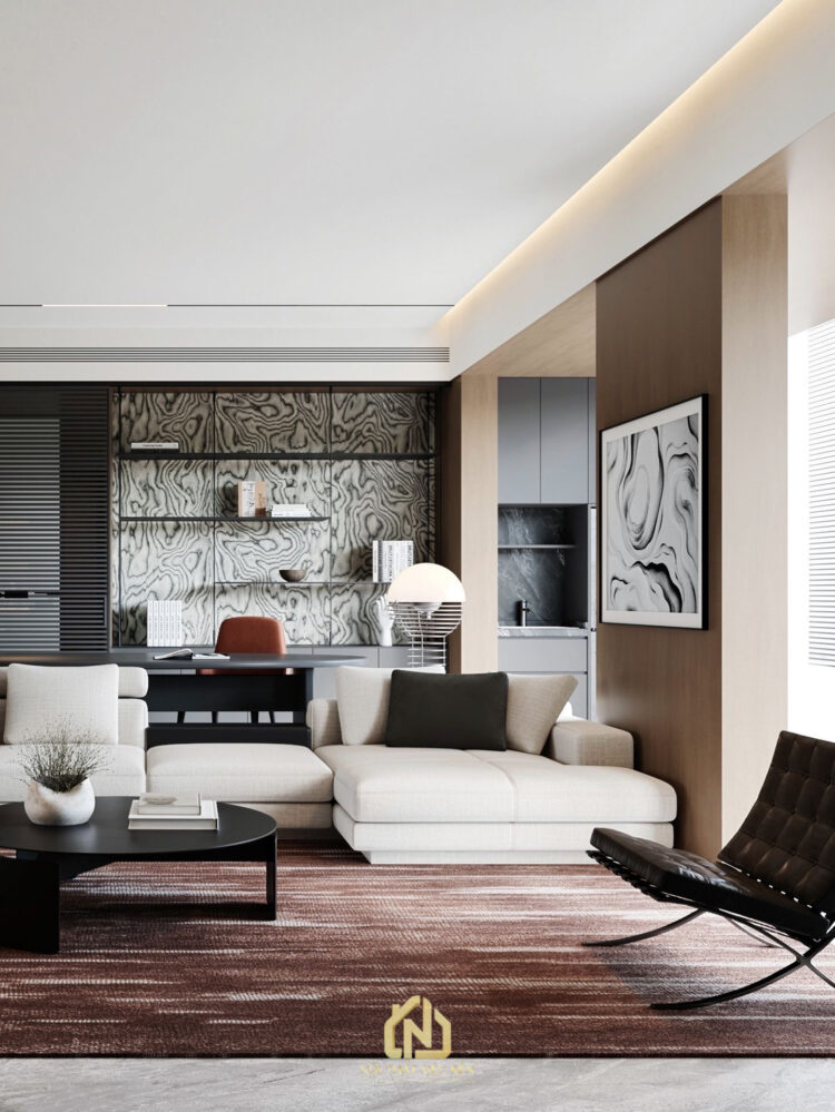 Phòng khách căn hộ Grand Marina Saigon với sofa sáng màu và tranh trang trí