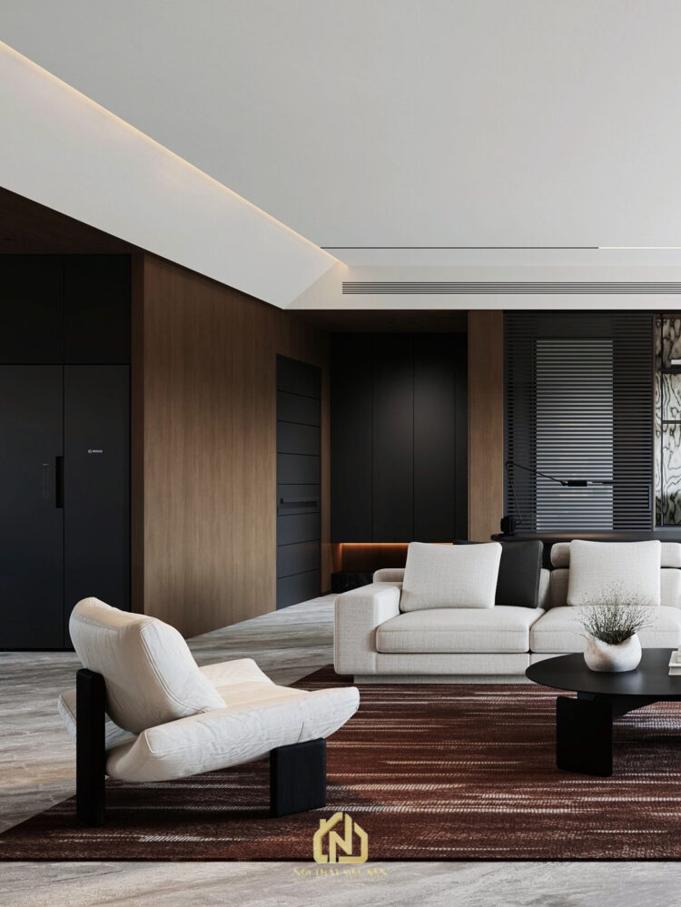 Phòng khách căn hộ Grand Marina Saigon với sofa cong và thảm sàn trầm ấm